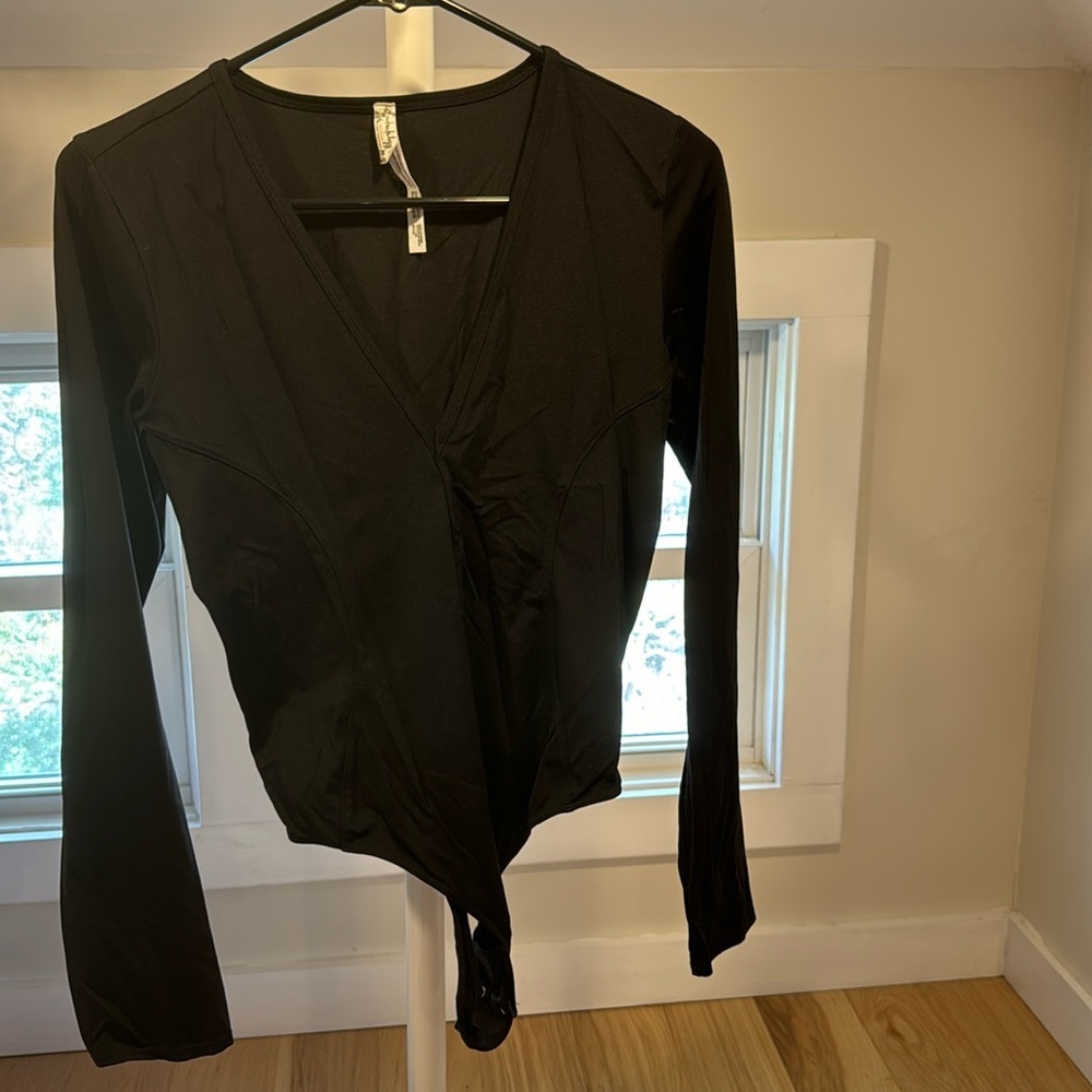 Free people black plunge body suit, size M